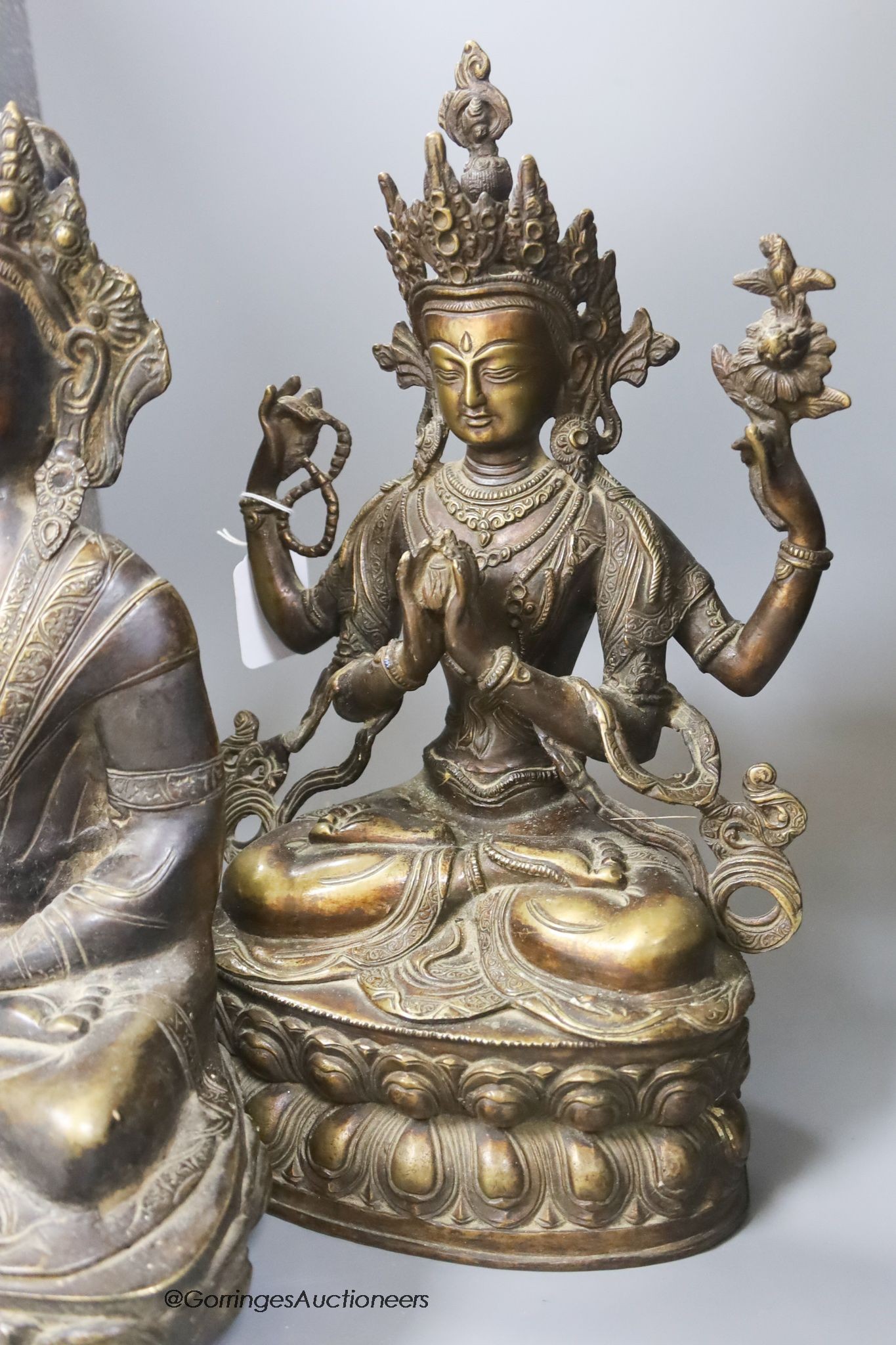 Two Asian bronze seated figures of Bodhisattvas, 37 cm high